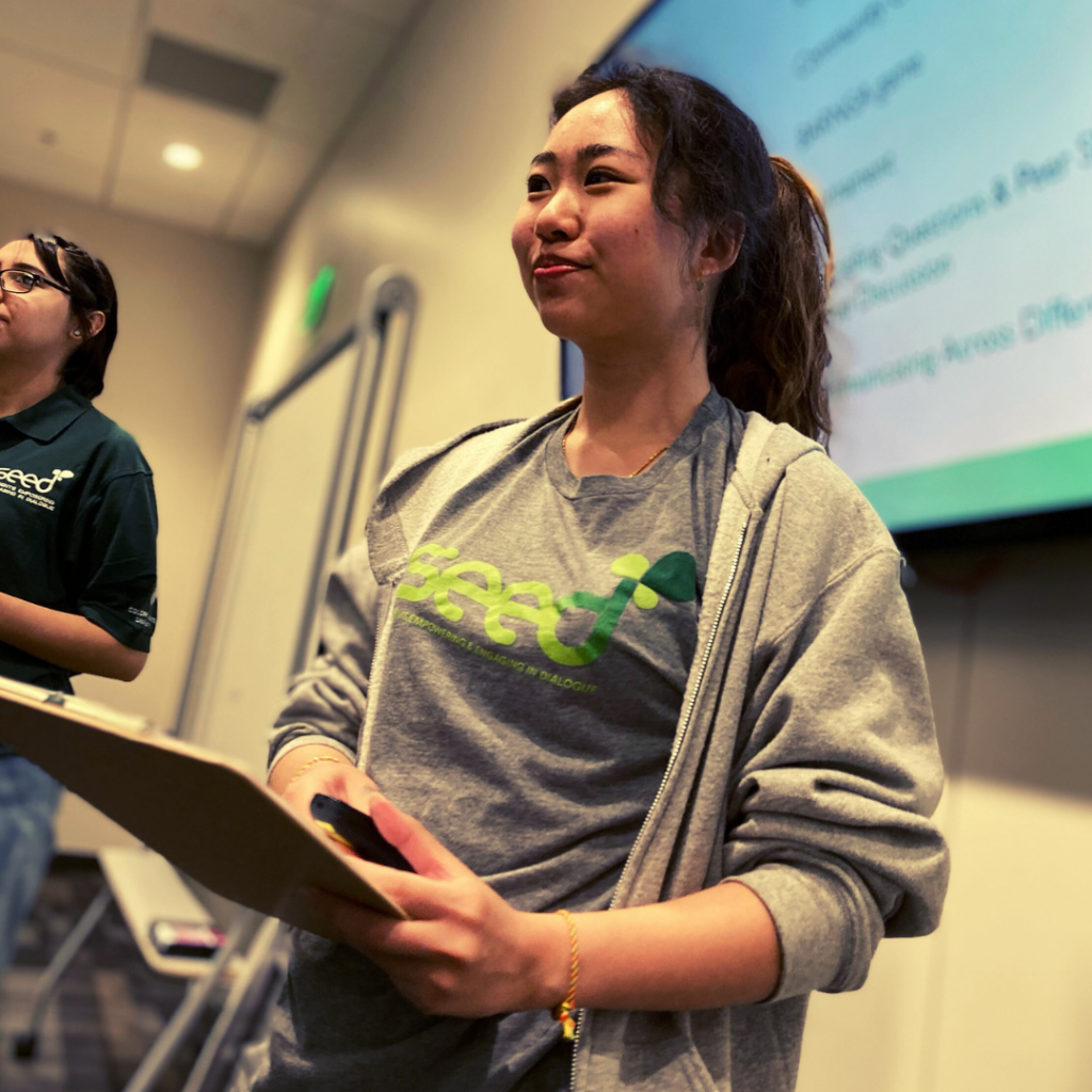 A student educator facilitates a workshop